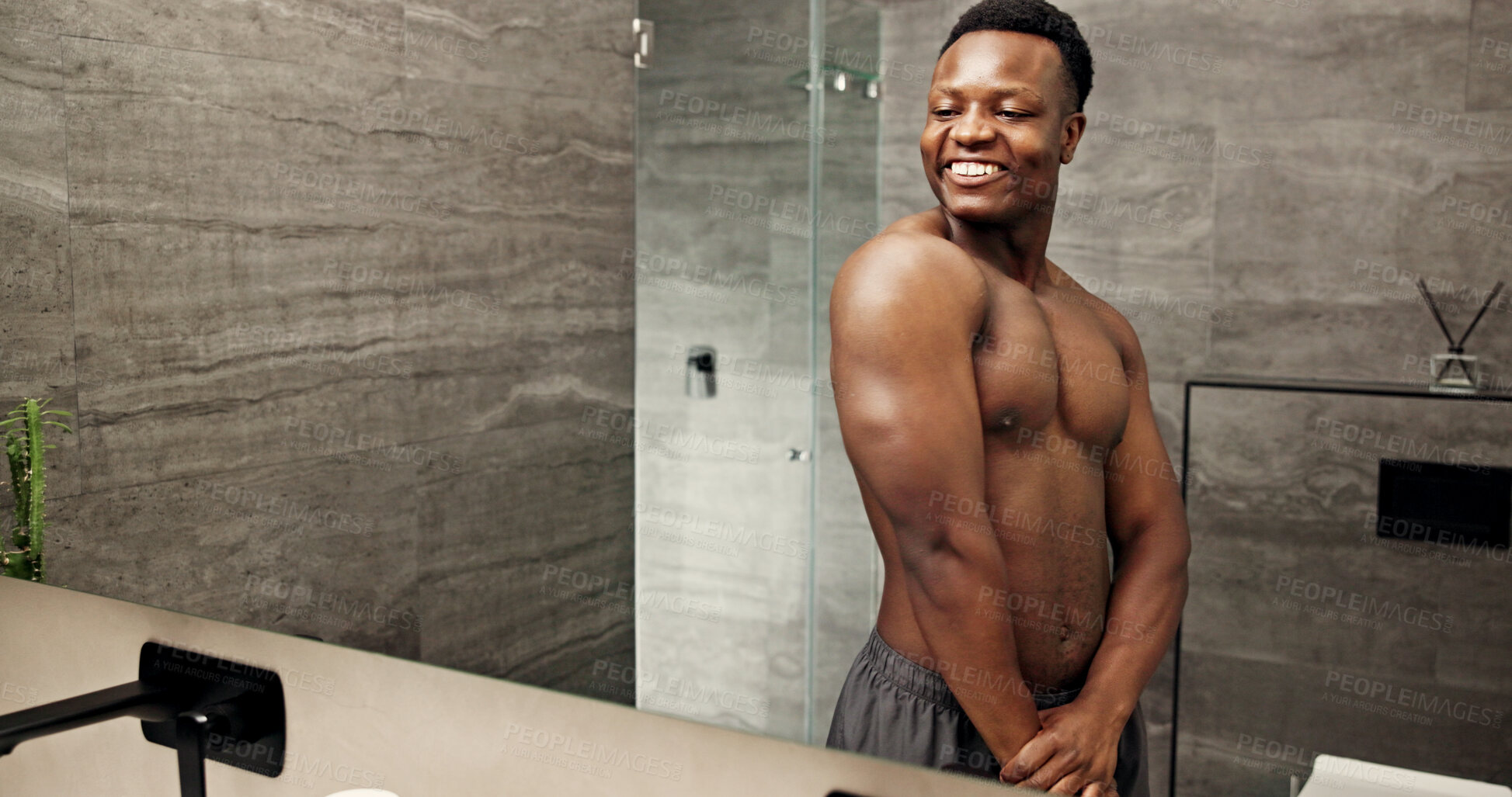 Buy stock photo Happy, black man and mirror for flexing in bathroom of fitness progress, muscle growth and workout pride. Smile, male person and reflection of strong biceps, grooming routine and bodybuilder at house