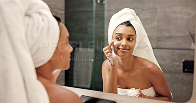 Buy stock photo Bathroom, mirror and woman with cream for skincare, wellness and anti aging benefits in morning. Home, reflection and female person with smile for cosmetics, beauty treatment and moisturizer for face