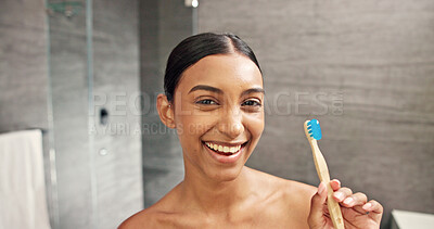 Buy stock photo Happy woman, toothbrush and toothpaste in bathroom for portrait, product recommendation and dental care. Girl, bamboo brush and minty gel in home for oral health, wellness and smile with mirror POV