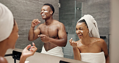 Buy stock photo Cream, skincare and laughing with couple in bathroom for beauty, morning routine and cosmetics. Bonding, hotel resort and cleaning with man and woman at home for grooming, spa glow and self care