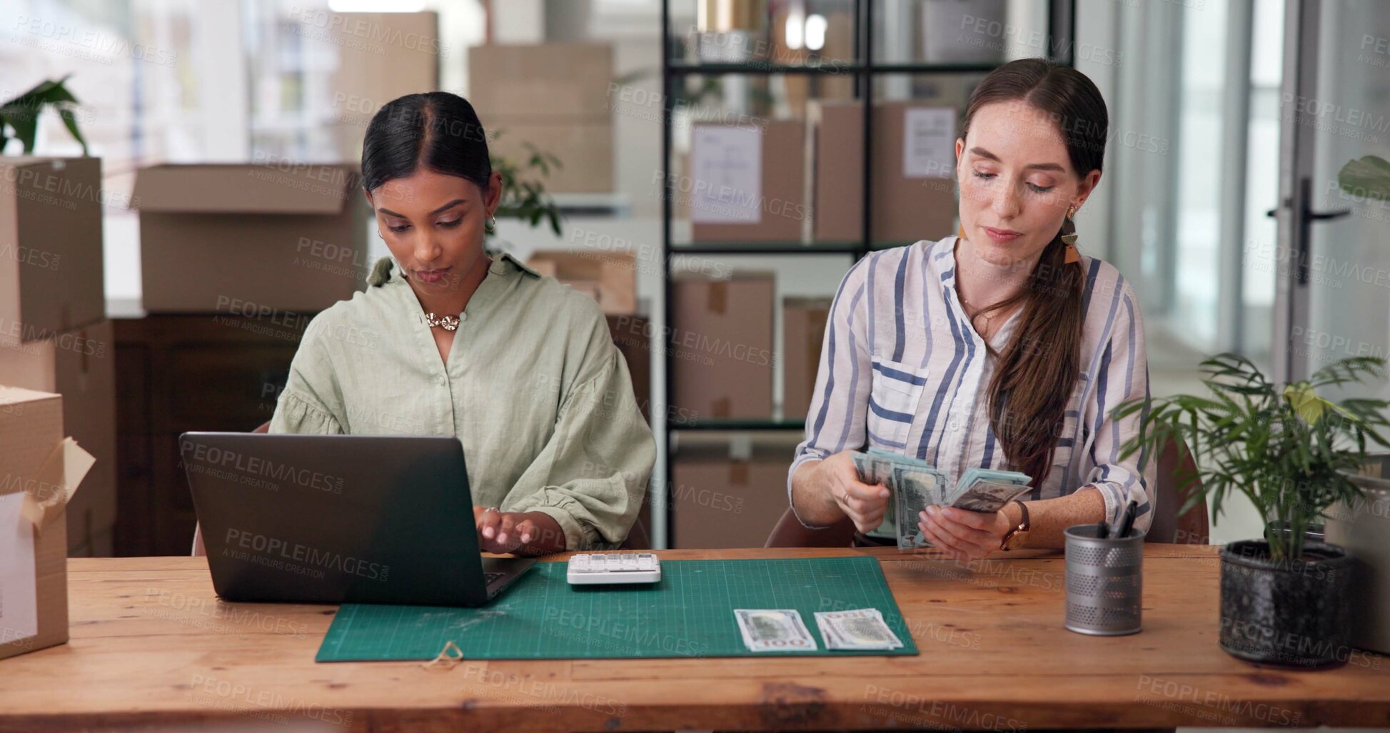 Buy stock photo Laptop, money and supply chain with women in office together for budget, expenses or profit. Accounting, calculator and logistics with employee team in workplace for ecommerce delivery or shipping