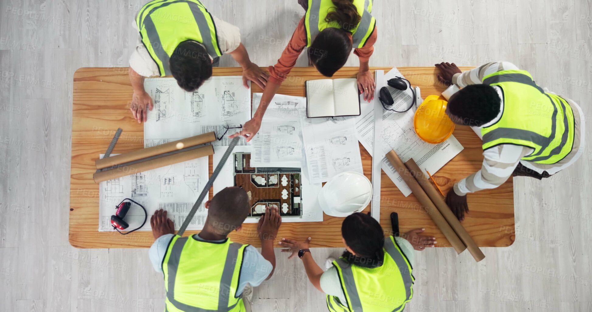Buy stock photo Above, architecture or people in meeting for collaboration, building design or strategy at space. Engineer team, planning or blueprint in office for home renovation, urban development or construction