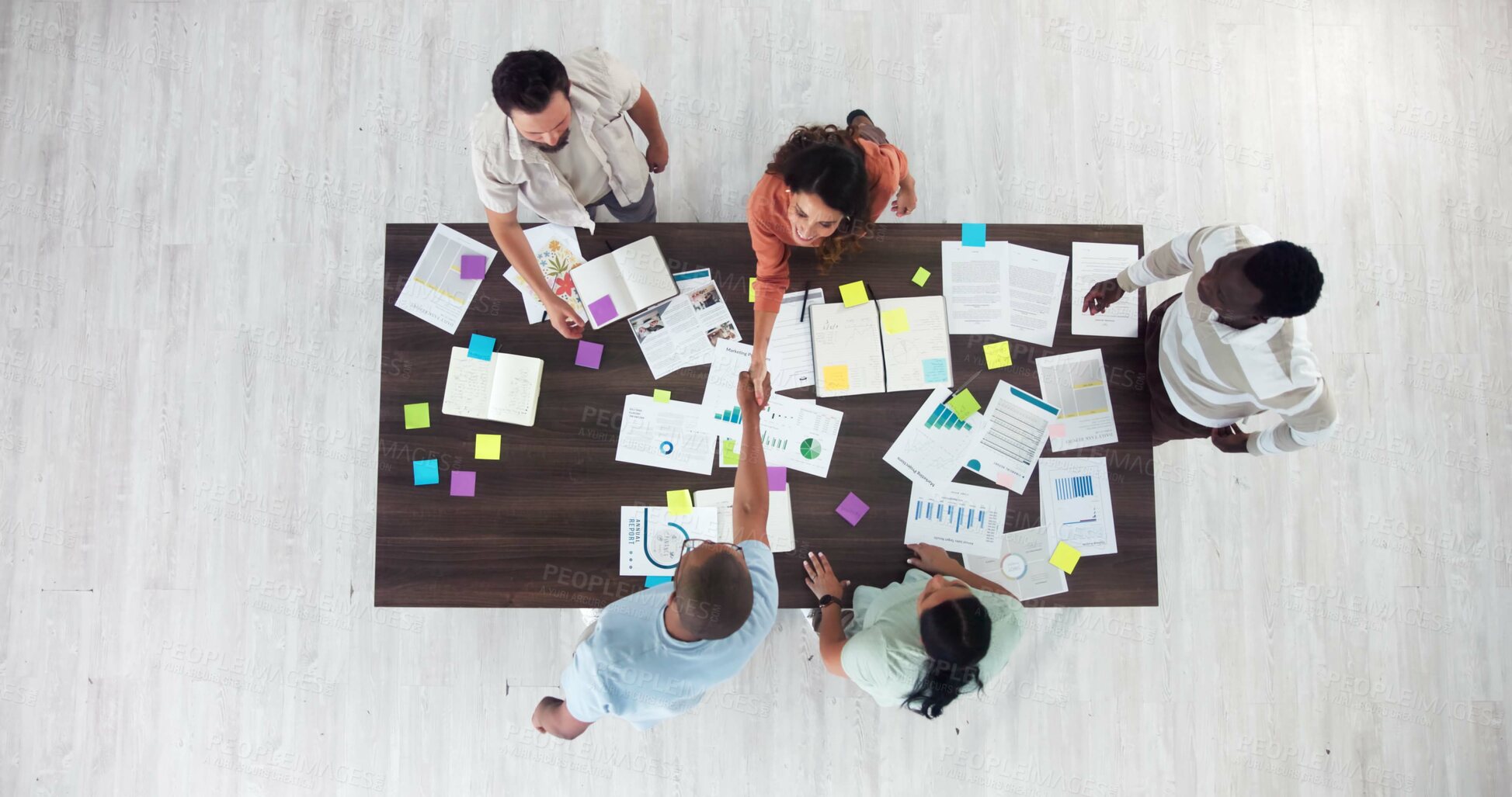 Buy stock photo Above, meeting and handshake with business people in office for event planning, budget approval and agreement. Project management, teamwork and proposal success with employees for campaign producer