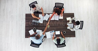 Buy stock photo Above, success and handshake with business people in meeting for event planning, budget approval or agreement. Shaking hands, teamwork and proposal solution with employees for campaign producer