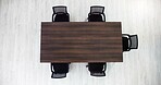 Boardroom, chairs and table in empty office from above for company meeting, seminar or training. Business, interior and space with furniture in corporate workplace for upskill development or workshop