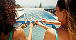 Champagne, cheers and luxury with friends at pool for spa resort, celebration and travel destination. Summer vacation, alcohol and toast with group of women at hotel for holiday, support and drinks