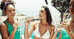Drinking, champagne and bridal shower with women at pool for hotel, celebration and holiday. Travel, summer and bachelorette party with group of friends at resort for luxury, vacation and swimwear