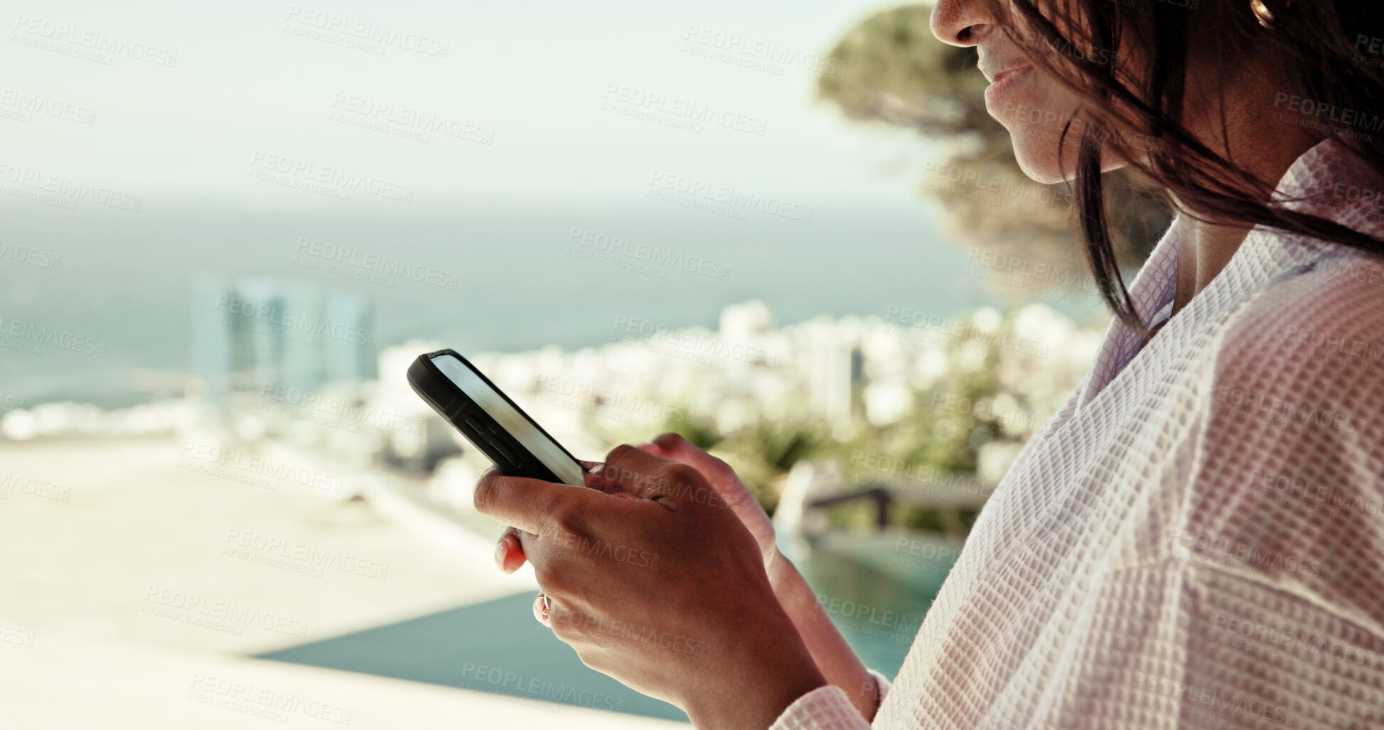 Buy stock photo Woman, hands and phone at hotel for travel, social media update or accommodation review. Influencer, summer vacation and mobile on resort rooftop for booking app, follower interaction or hospitality