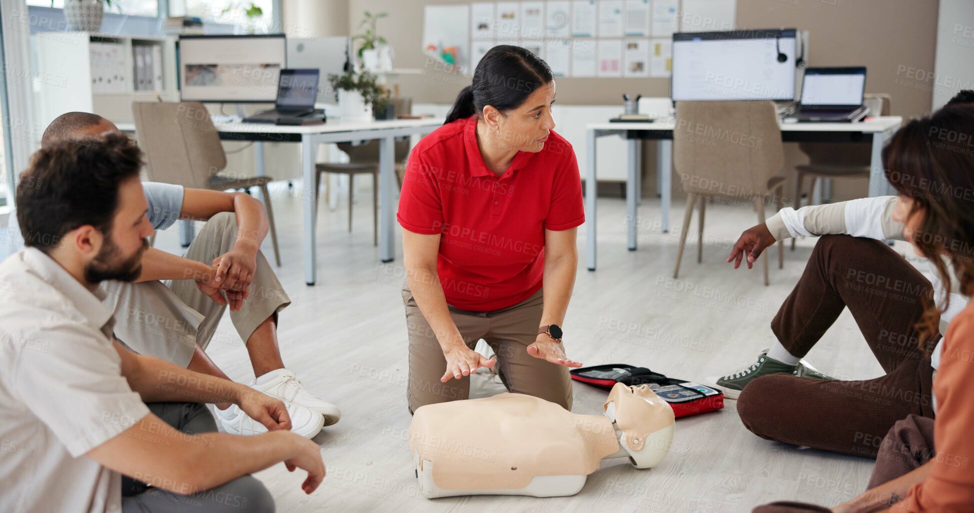 Buy stock photo First aid, cpr training and people in office, mannequin for safety compliance and company healthcare. Paramedic course, medical demonstration and teaching emergency rescue technique in business