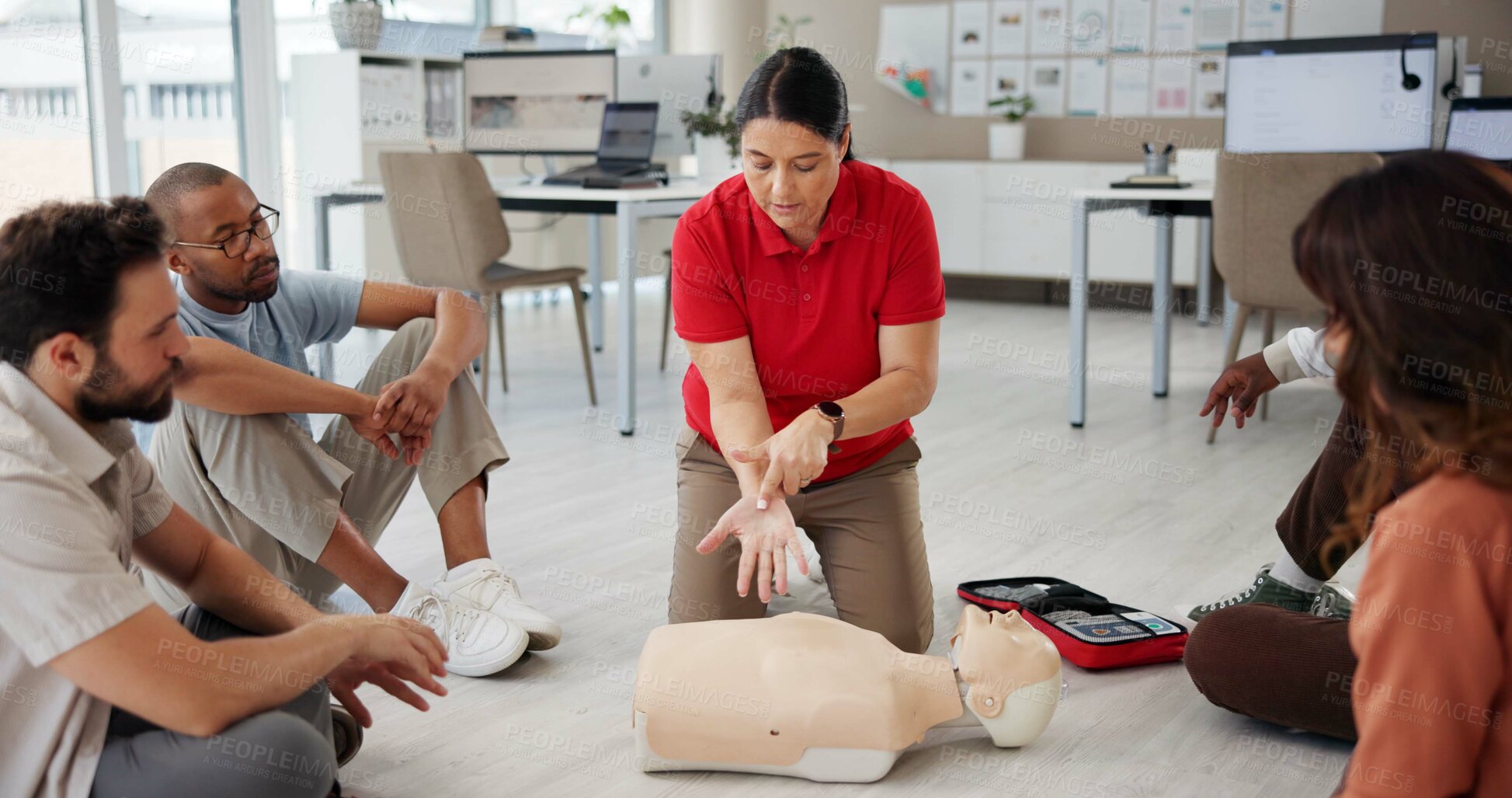 Buy stock photo First aid, cpr training and people with mannequin for safety compliance or healthcare. Paramedic course, medical demonstration and teaching emergency rescue technique with hand in business office