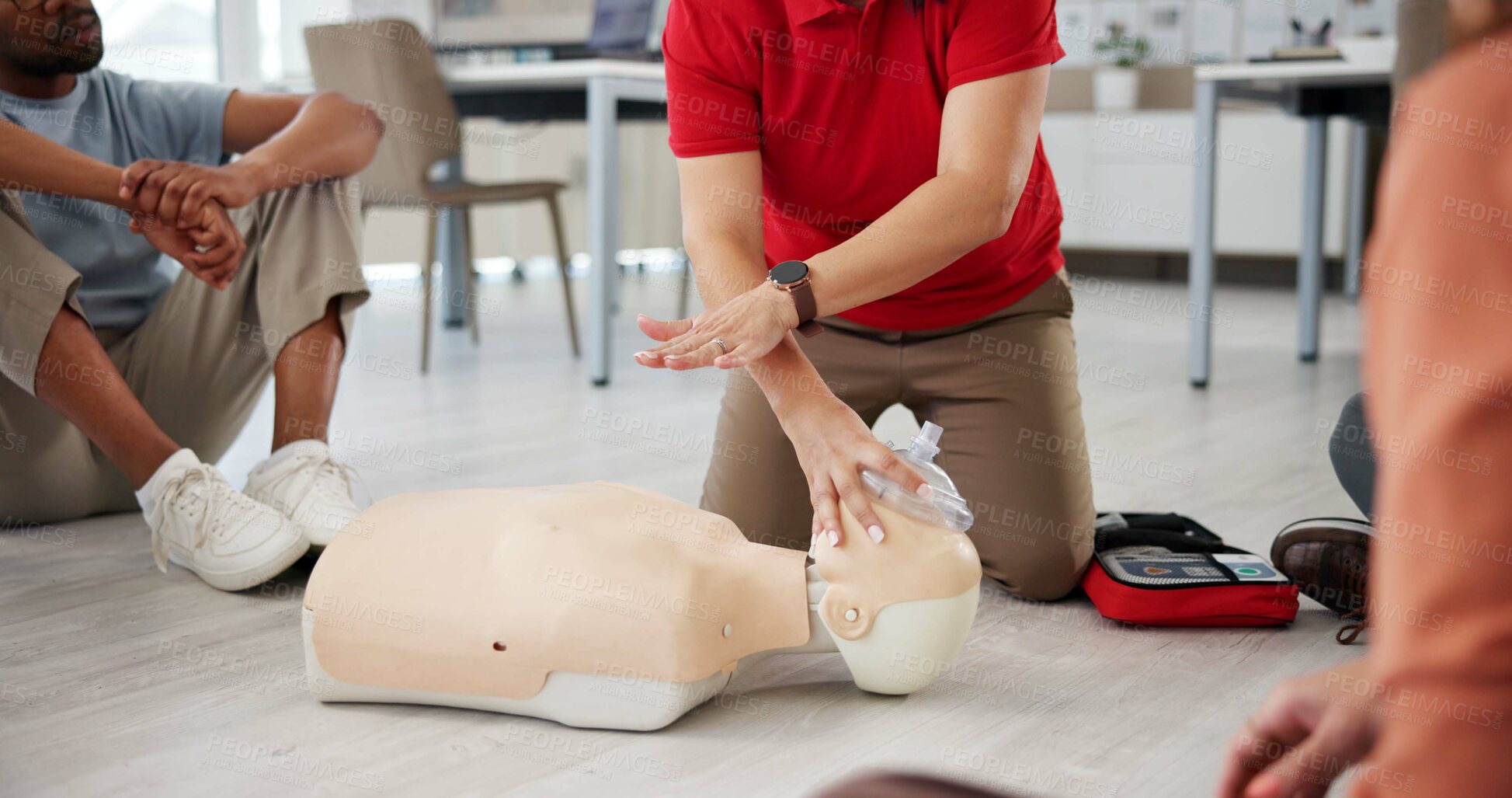 Buy stock photo First aid, training and hands in office with dummy for safety compliance, healthcare or respirator mask for breathing. Paramedic course, cpr and person teaching emergency rescue technique in business