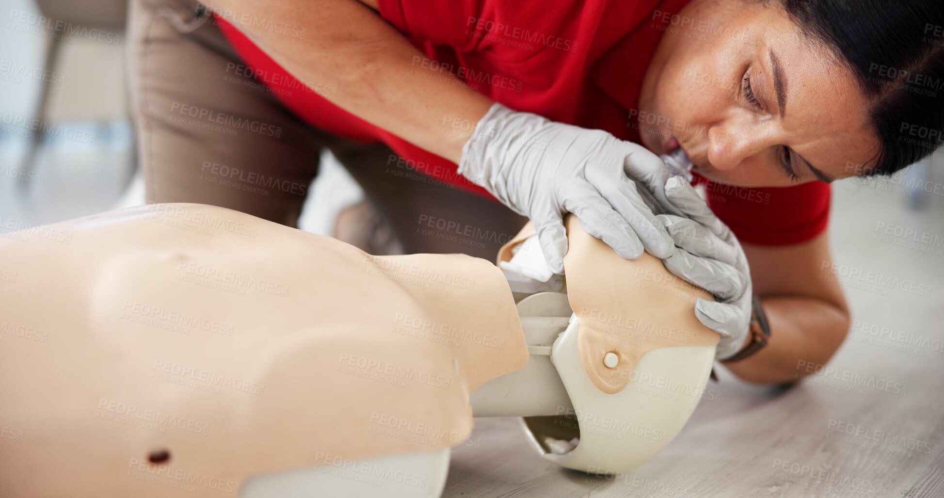 Buy stock photo Mouth, cpr and training with person and mannequin for first aid workshop, open airway and safety protocol. Healthcare class, medical simulation and breathing hazard with woman in paramedic course