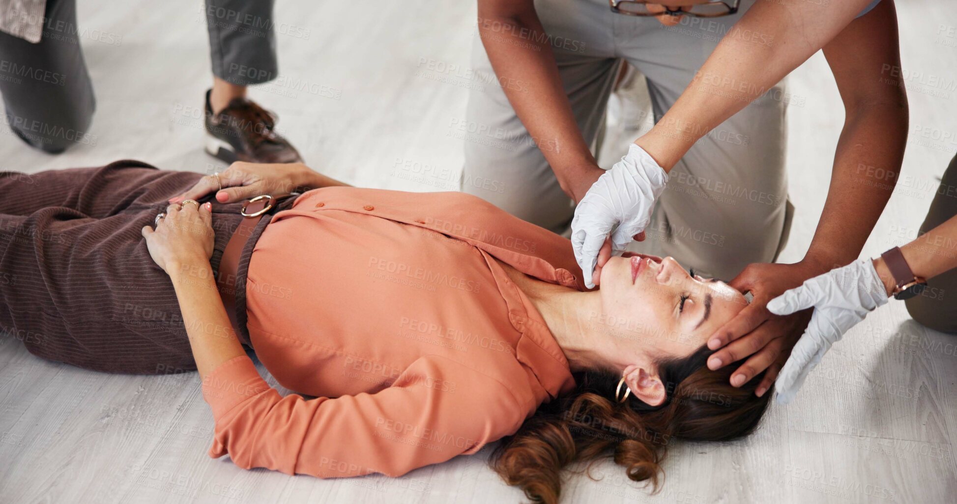 Buy stock photo People, demonstration and class for first aid, learning or titling for prevention of choking or breathing. Airway management, teacher and technique to help with cardiac arrest, hands or CPR for group