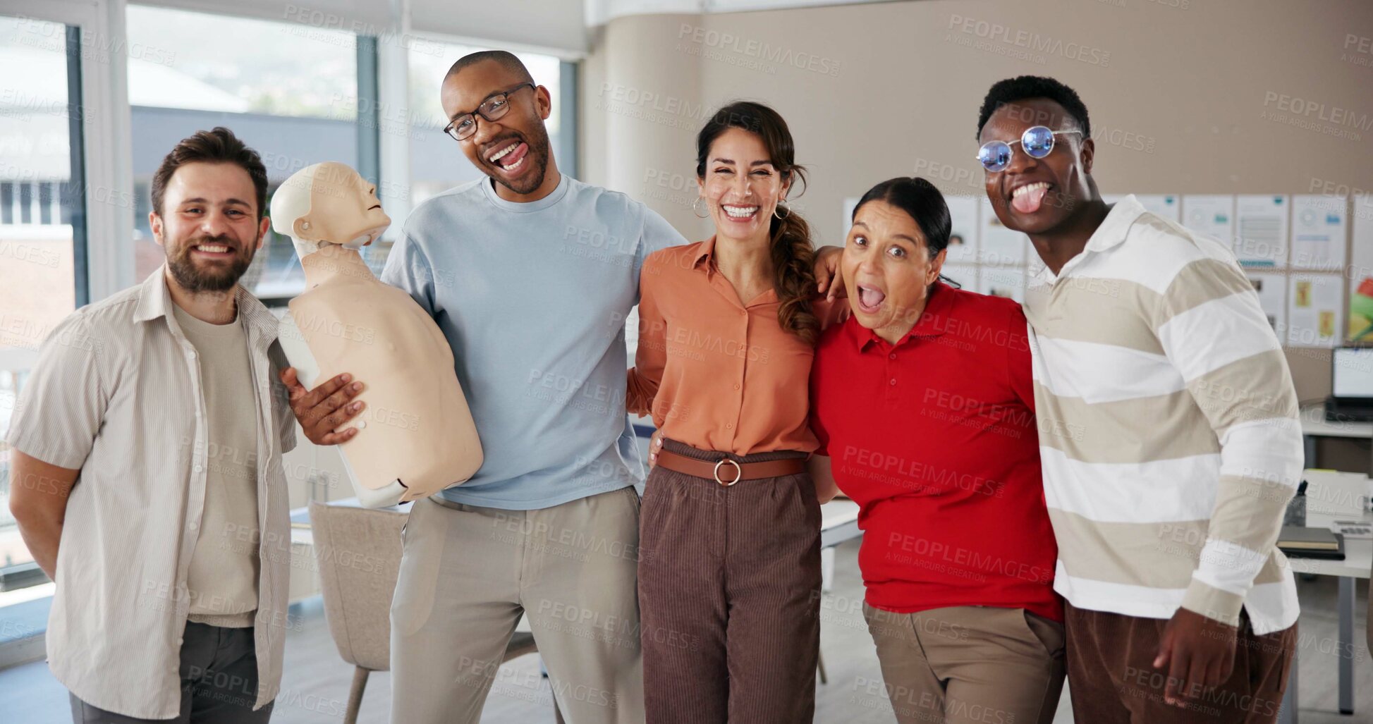 Buy stock photo Portrait, happy and paramedic with business people in office for first aid training with emergency service. Goofy, dummy and female healthcare instructor with corporate employees for medical course.