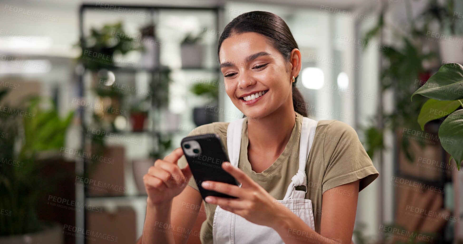 Buy stock photo Phone, woman and florist in shop for order review with small business at startup flower store. Happy, cellphone and female botanist on mobile app for floral biology research in retail plant nursery.