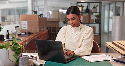 Buy stock photo Distribution, office and business woman on laptop for reading order, logistics email or sales of sustainable plants. Typing, shipping or computer for stock, check inventory or supply chain in startup