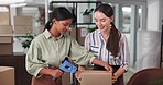 Packaging, entrepreneur and people with tape, boxes and teamwork for logistics in office, smile or order. Shipping, supply chain or preparing for delivery in warehouse, stock or partnership for women