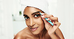 Woman, portrait and eyebrows with tweezer for microblading, grooming or skincare in bathroom. Face, female person or smile with pluck tool for hair removal, epilation or facial correction at home