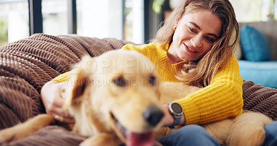 Buy stock photo House, dog and woman on sofa, relax and bonding together with smile, happiness and care. Apartment, pet and person on couch, comfort and domestic animal with wellness, playful and resting in lounge