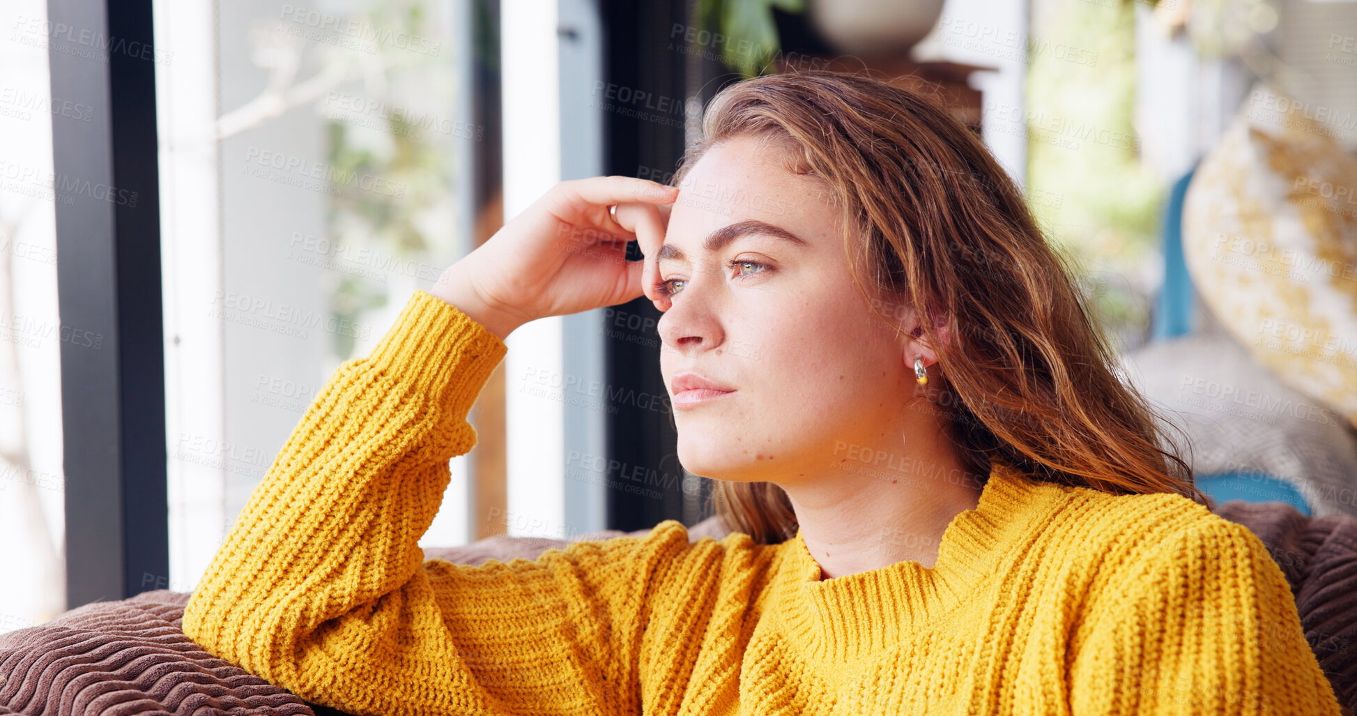 Buy stock photo Daydreaming, calm and woman in lounge, relax and comfortable on couch in home, student and morning. Living room, thinking and person on sofa for break, cozy or serious in new apartment for university