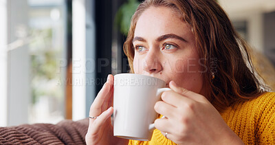 Buy stock photo Thinking, cozy and woman with coffee, home and calm with beverage in living room, relax and break. Lounge, rest and drinking of tea on couch, comfortable and person with daydream in apartment