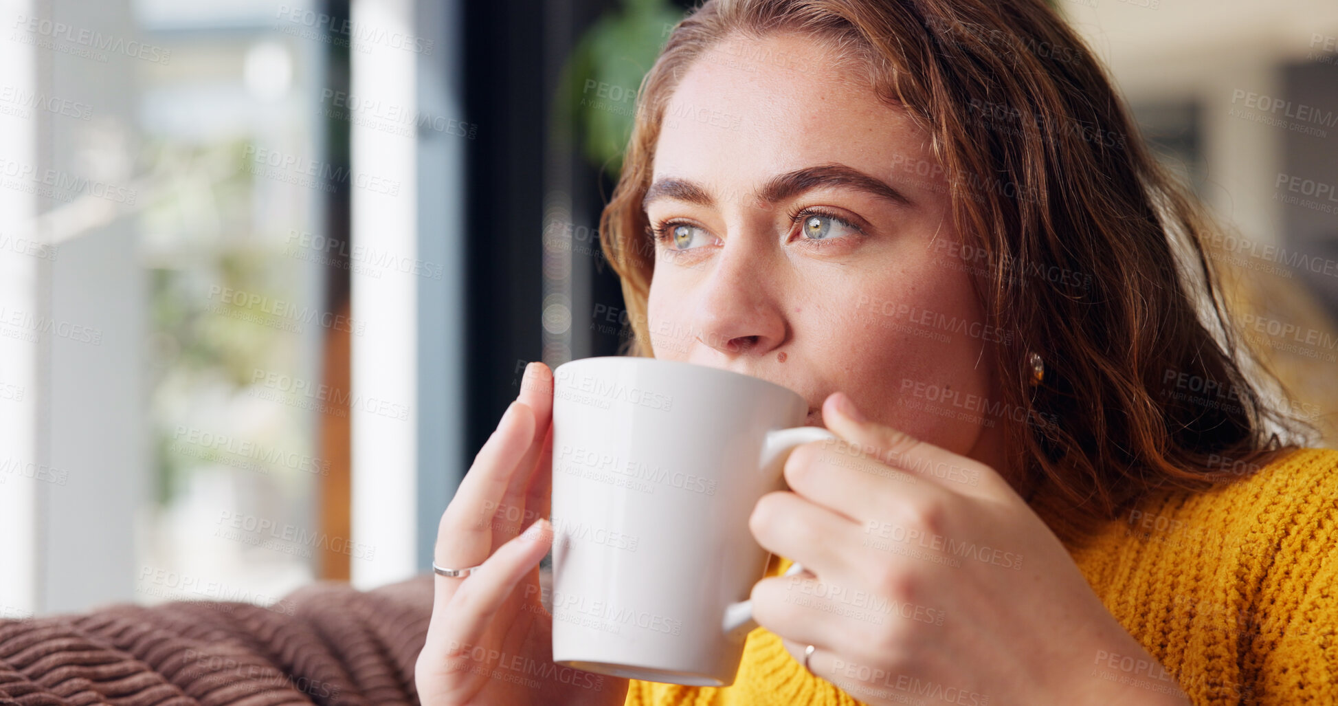 Buy stock photo Thinking, cozy and woman with coffee, home and calm with beverage in living room, relax and break. Lounge, rest and drinking of tea on couch, comfortable and person with daydream in apartment