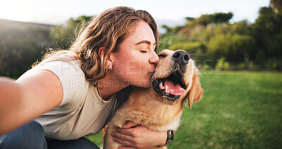 Buy stock photo Woman, kiss and selfie with dog on grass field for picture, memory or companion in nature. Female person, labrador or golden retriever with hug or affection for capture, support or care for pet