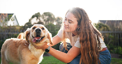Buy stock photo Playing, bonding and woman with dog outdoor for connection with animal adoption at home. Happy, companion and female person with puppy for fun together with pet insurance in backyard at house.