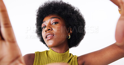 Buy stock photo Hand frame, beauty and black woman in studio for profile picture, memory or selfie for fashion. Happy, portrait and African content creator with photography for social media by white background.