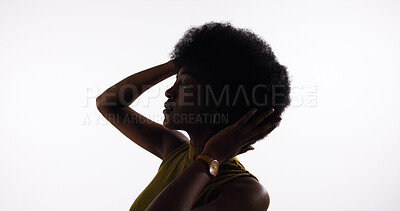 Buy stock photo Beauty, afro care and black woman with hair, salon treatment and natural texture with volume. Cosmetics, hairstyle and African model with growth or aesthetic in silhouette on white studio background