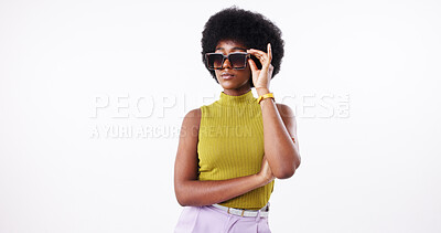 Buy stock photo Pride, black woman and sunglasses of fashion in studio with casual clothes, natural afro and trendy. Female person, arms crossed and stylish shades of confidence, colourful style and white background