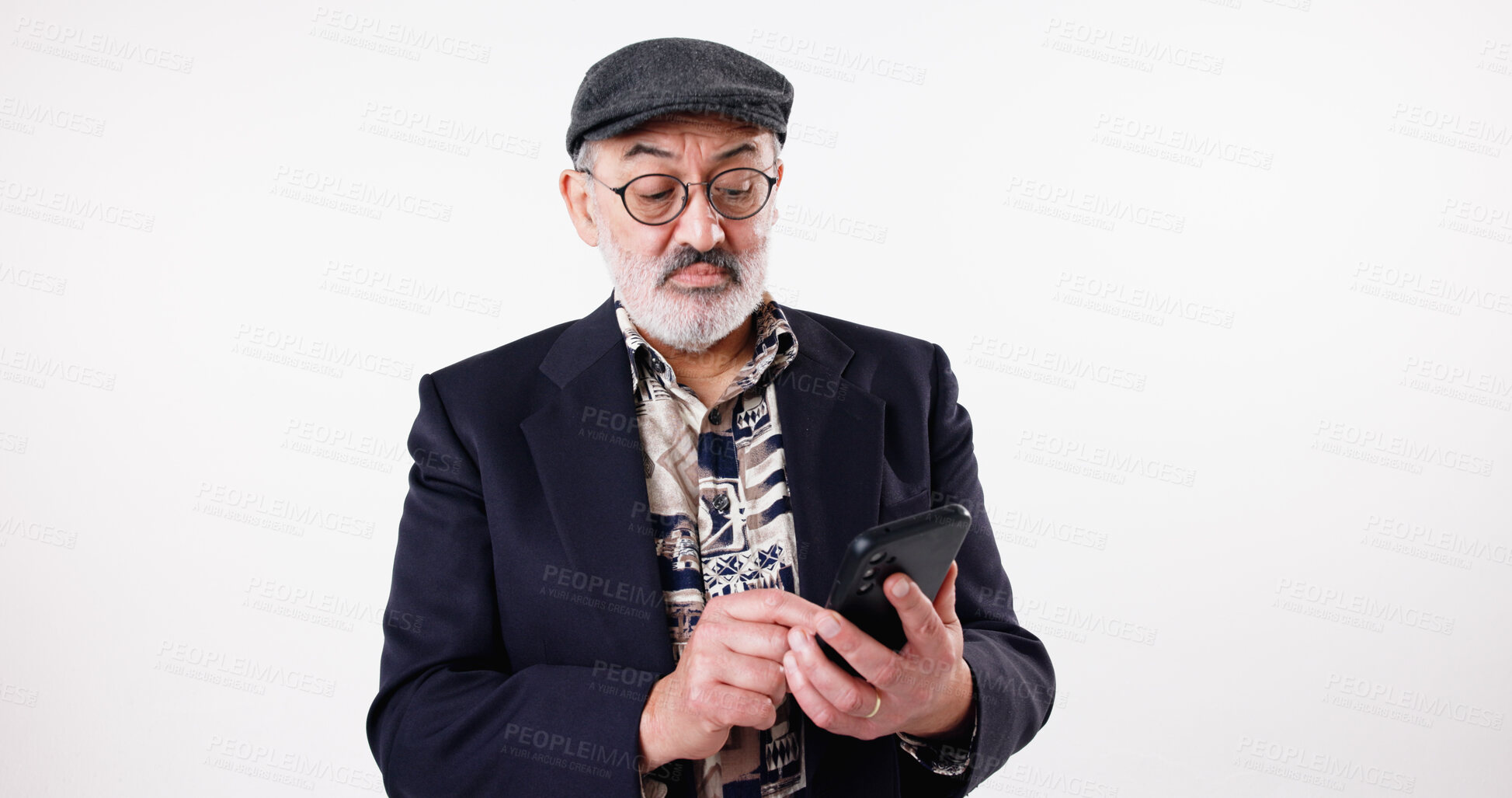 Buy stock photo Cellphone, glasses and senior man in studio, internet and mobile app on white background. Email notification, model and mature person with smartphone, communication and eyewear for message to contact