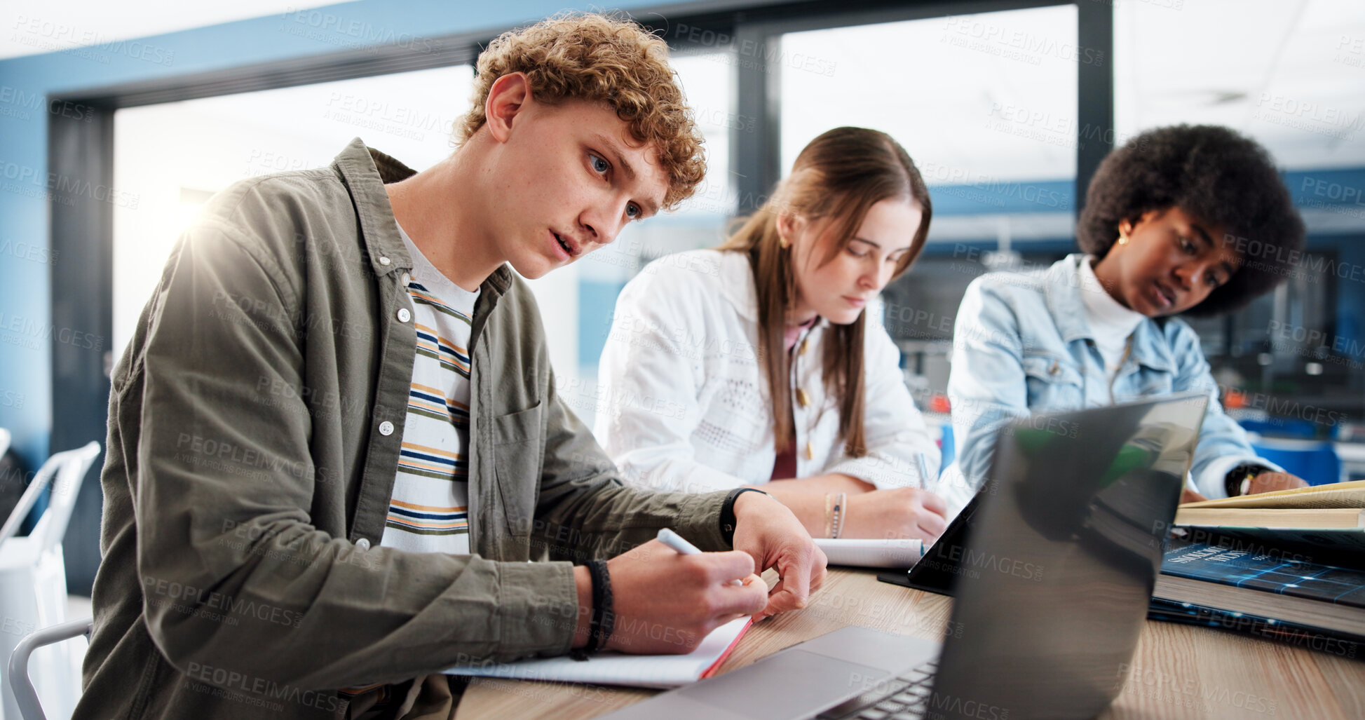 Buy stock photo Studying, group and students with laptop, classroom and research for assignment in college or writing. Education, learning and people with tech for knowledge, university and teamwork for project