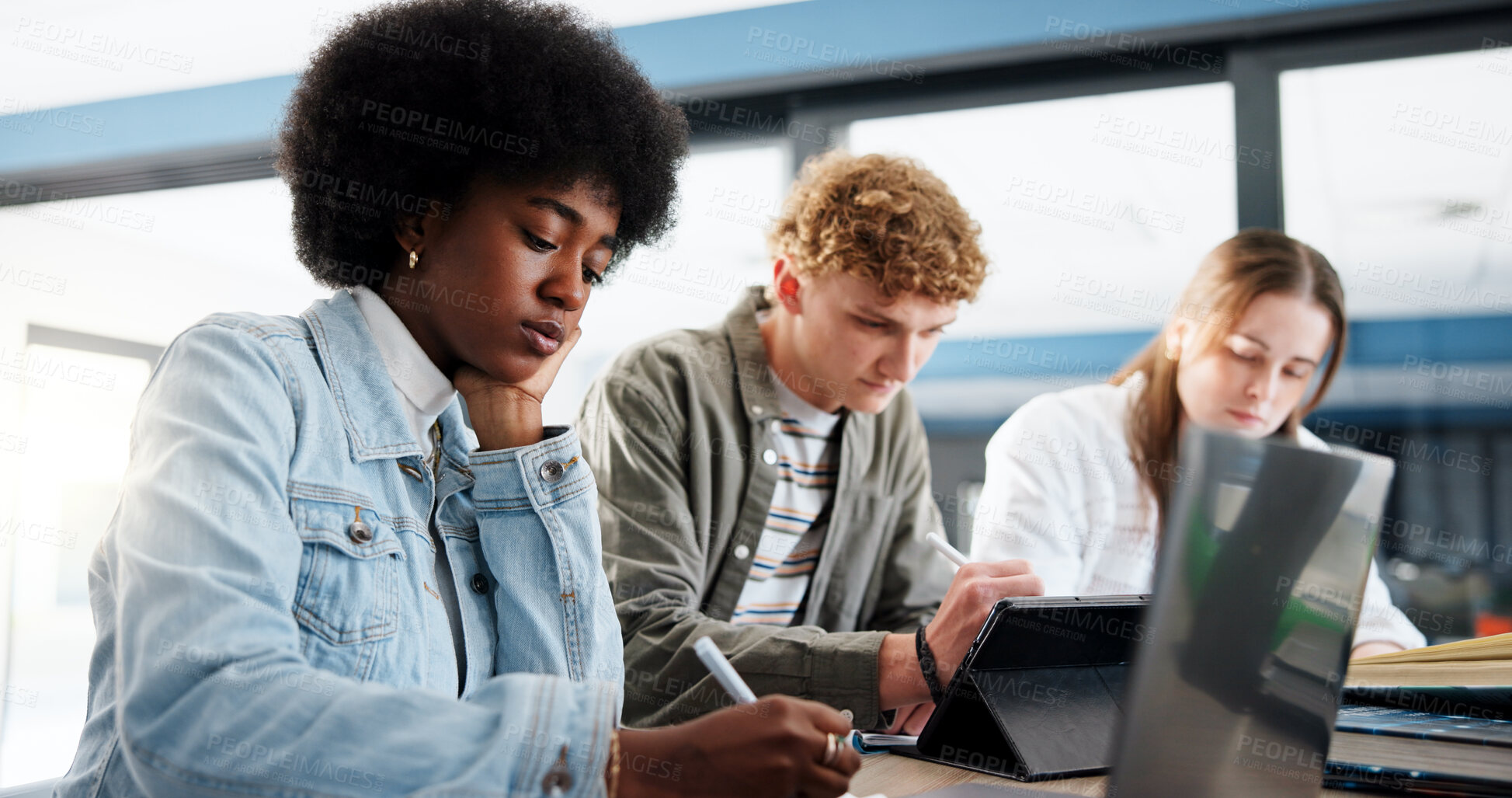 Buy stock photo Research, group and students with laptop, classroom and studying for assignment in college or writing. Education, learning and people with tech for knowledge, university and teamwork for project