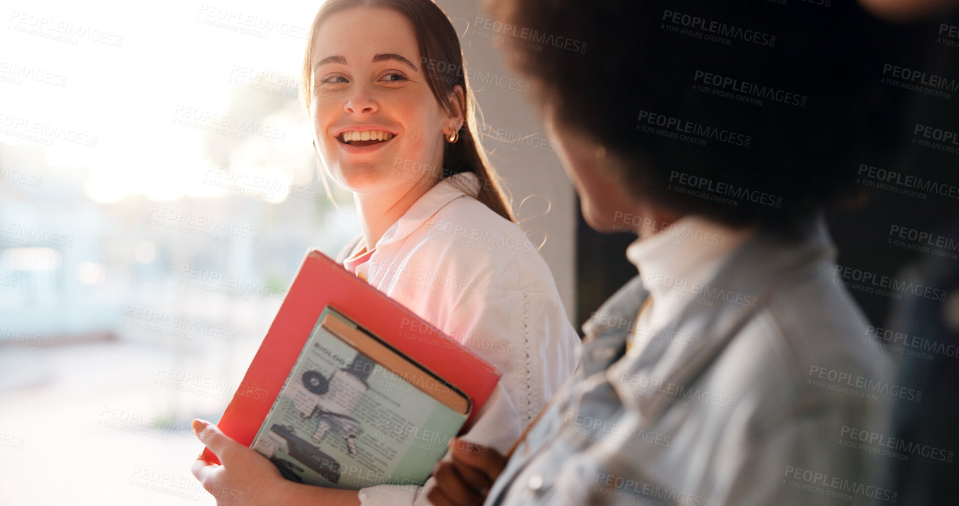 Buy stock photo Happy women, students and discussion with books for education, learning or sharing knowledge at university. Female people, friends or chat with smile, academic or biology textbook for science project