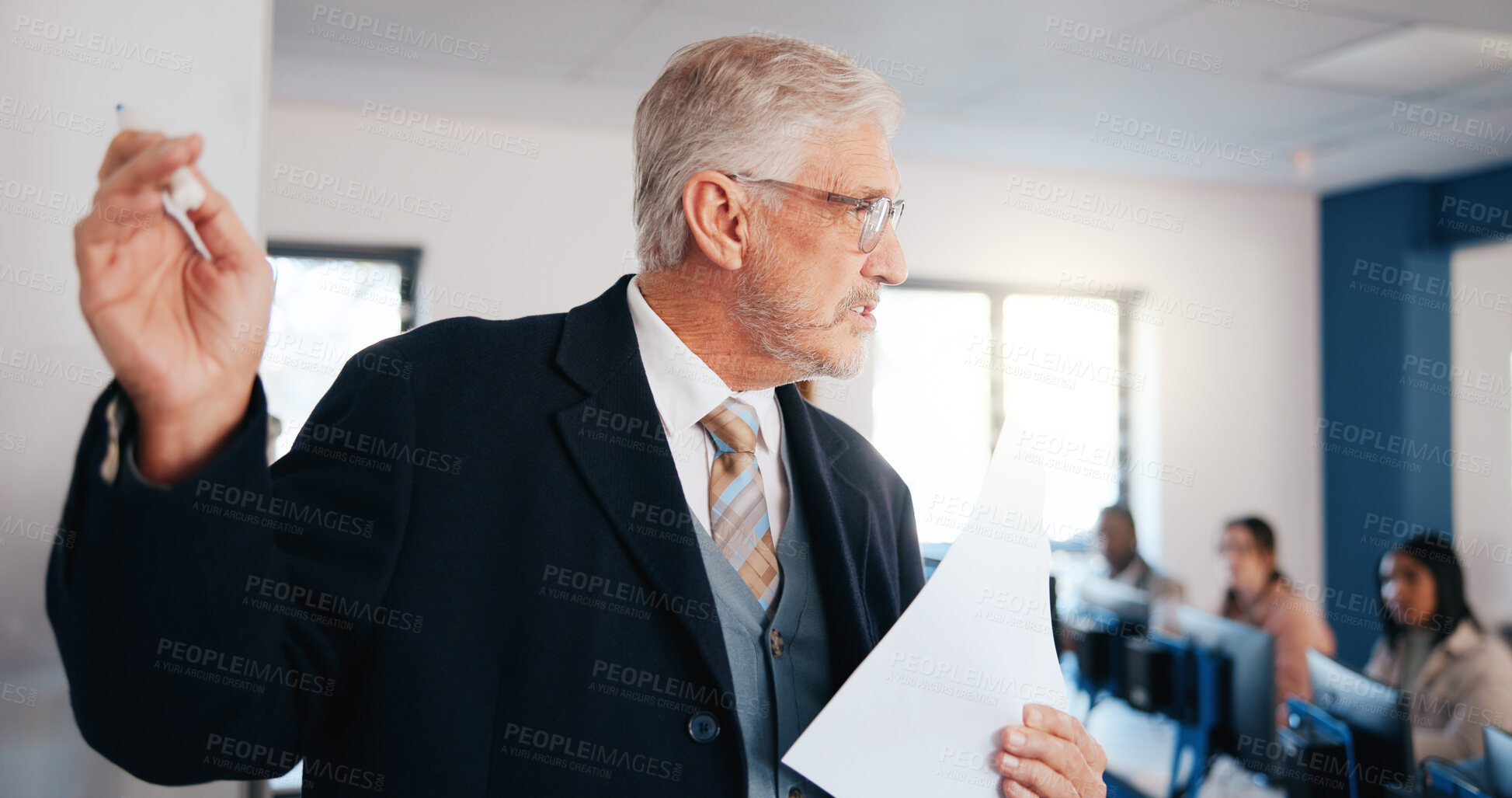 Buy stock photo Mature man, lecturer and teaching with whiteboard in classroom for presentation, lesson or IT course. Male person, professor or teacher with curriculum or students for higher education or knowledge