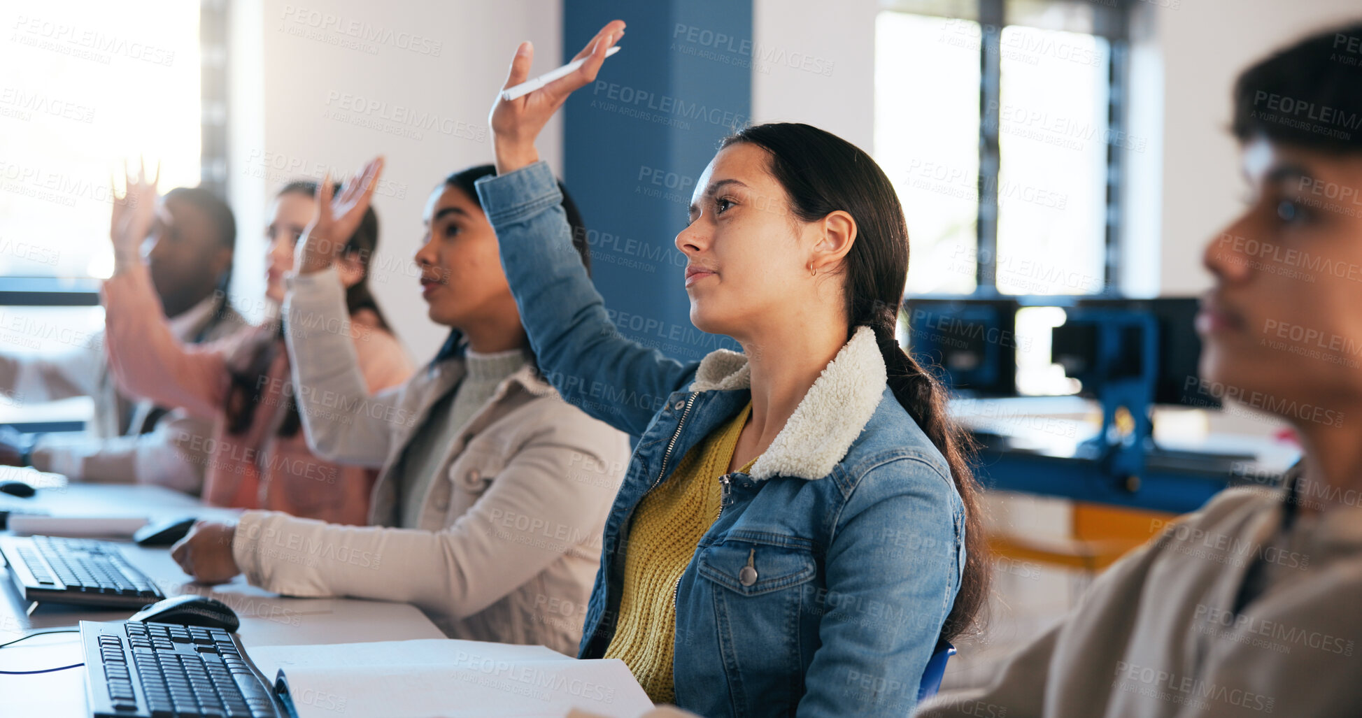 Buy stock photo People, students and hands raised with question in classroom for lesson, lecture or presentation at university. Young, group or learners in class for interaction, answer or participation at college