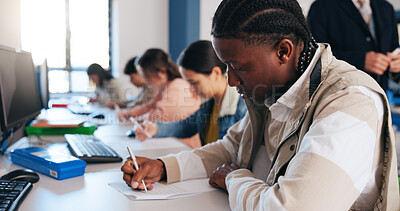 Buy stock photo Student exam, college test and man writing with paper in classroom for education, research and knowledge. Person, university and study for scholarship, opportunity and academic future and paperwork