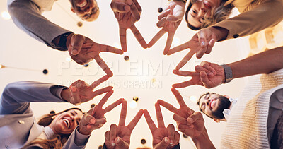 Buy stock photo Happy, business people or meeting with finger star below for unity, motivation or teamwork at office. Low angle, employee or group with shape or smile in union or solidarity for mission or synergy