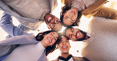 Buy stock photo Happy group, portrait and huddle with team below for motivation, unity or mission together. Low angle, faces or excited people with smile, hug or support for community solidarity, trust or synergy