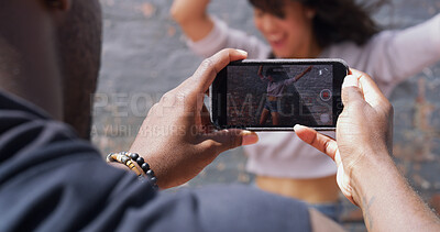 Buy stock photo Phone screen, dancing and recording with couple, hands and capture moment with influencer. Live streaming, outdoor and people with smartphone, mobile app and photography with social media or New York