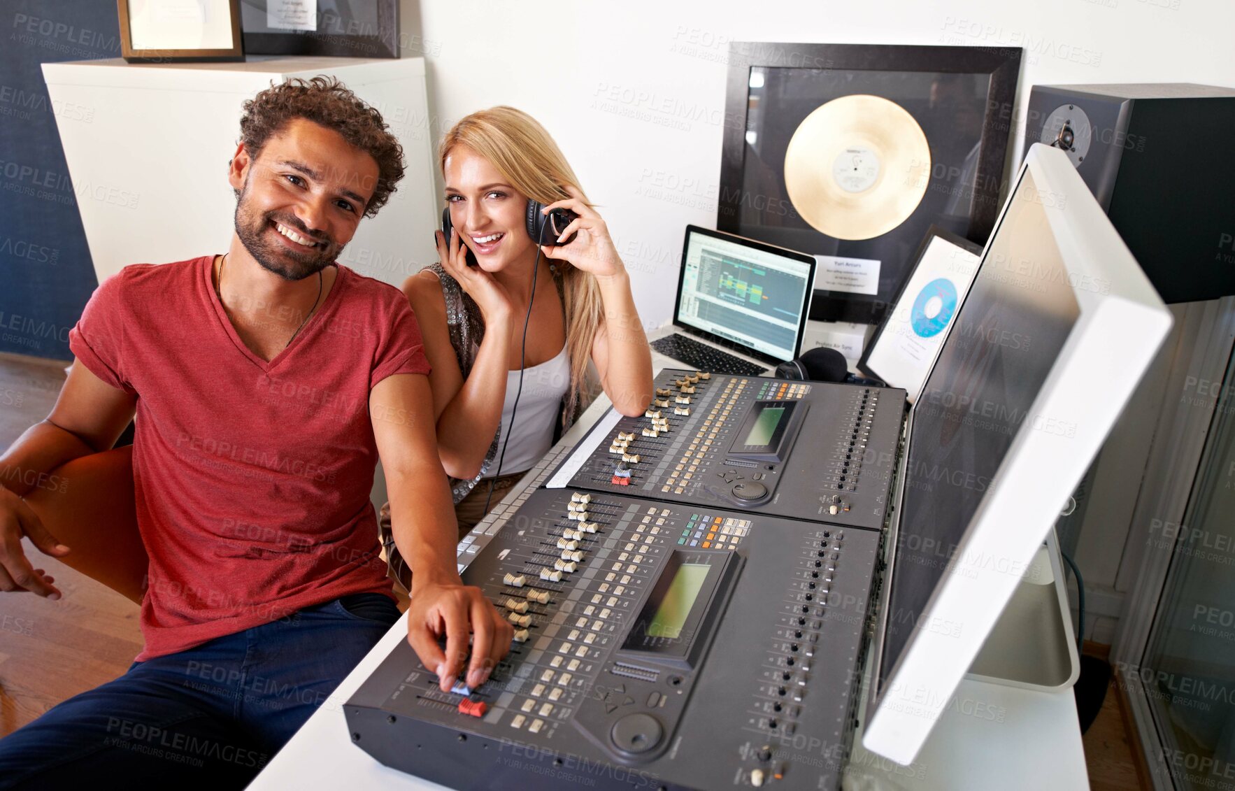 Buy stock photo Man, woman and audio engineering with mixer, computer and headphones in recording studio for music. Musician, artist and producer with sound tech for analysis, smile and portrait for entertainment