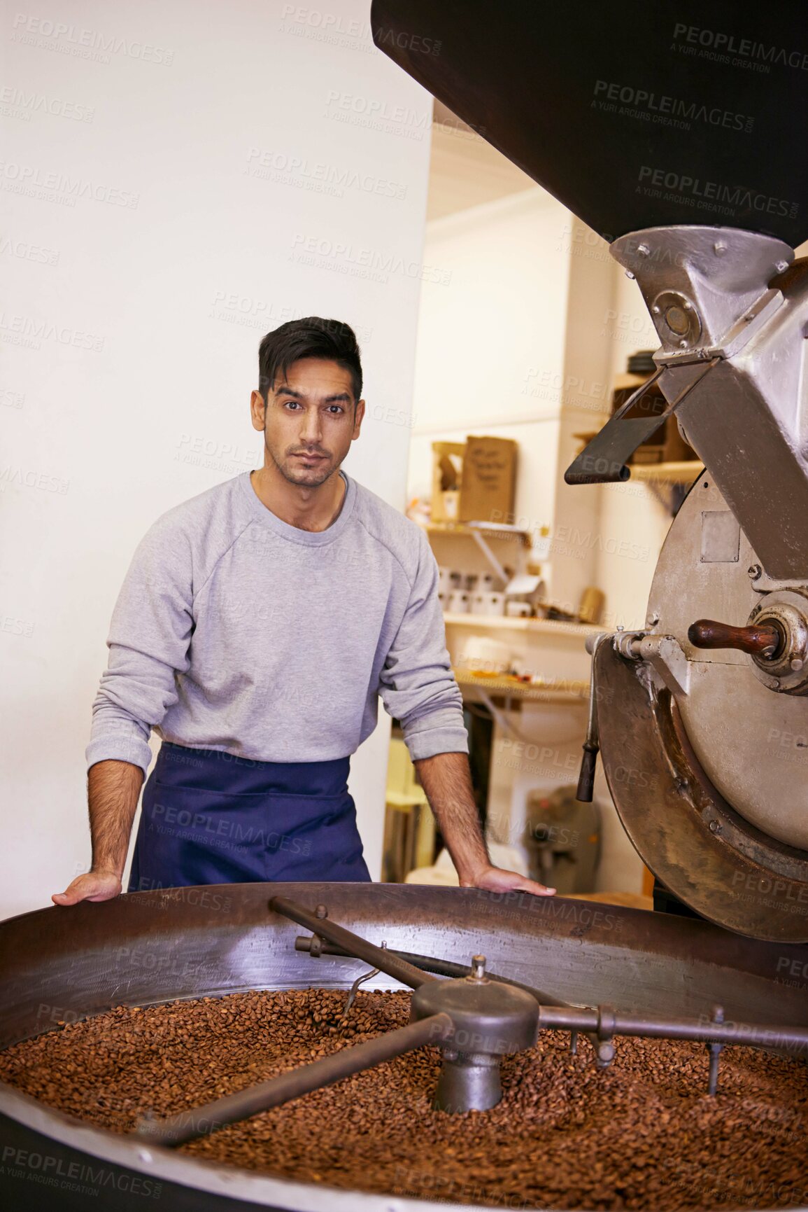 Buy stock photo Coffee, portrait and man with machine for roasting with small business, production and quality control. Entrepreneur, barista or roaster with beans at cafe, sustainable startup and espresso process