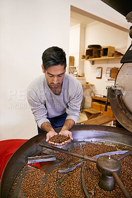 Buy stock photo Coffee, quality and man with machine for roast with blend, production and small business. Entrepreneur, barista or worker checking beans at cafe, sustainable startup or espresso process in Colombia