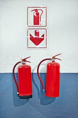 Buy stock photo Wall, fire extinguisher and sign for safety, emergency or protection in interior of room. Metal, equipment and tools for security with chemical in steel container for danger prevention on background