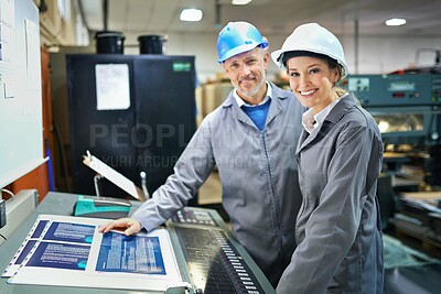 Buy stock photo Portrait of a people working inside a printing, packaging and distribution factory. The commercial designs displayed represent a simulation of a real product and have been changed or altered enough by our team of retouching and design specialists so that they don't have any copyright infringements