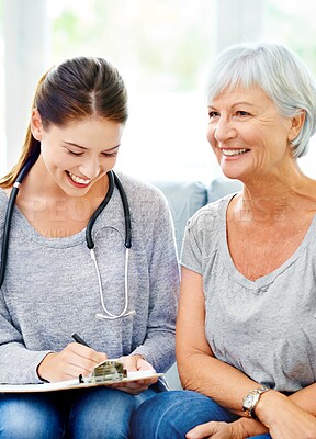 Buy stock photo Results, consultation and senior woman with doctor in home to check health with advice and support. Healthy, patient and therapist in elderly care with info or notes o, hypertension or blood pressure