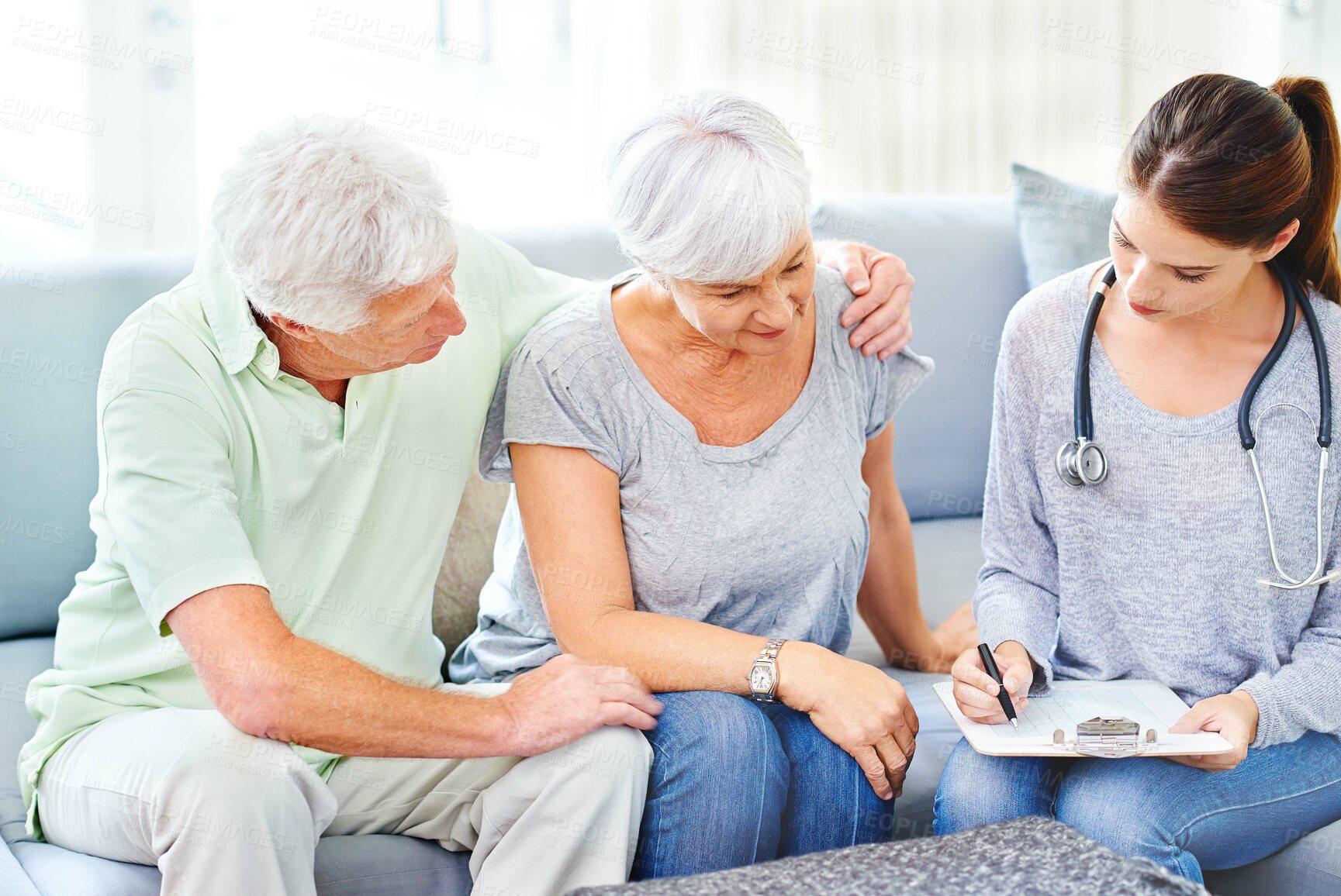 Buy stock photo Senior, couple and doctor with results for woman in consultation with advice and support. Patient, report and nurse in elderly care with news, info or medical notes on hypertension or blood pressure