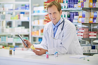 Buy stock photo Pharmacist, tablet and pills for prescription, portrait or medicine in drugstore, chemist or services. Male person, doctor and pharmaceuticals in clinic for stock, inventory for information or advice