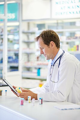 Buy stock photo Doctor, tablet and chemist for pills, dispensary and medicine in drugstore for inventory or telehealth. Male person, pharmacist and pharma in clinic for prescription, stock for information or advice